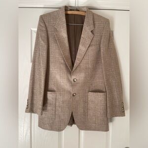 - Vintage Yves Saint Laurent Wool Houndstooth blazer.